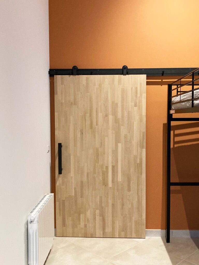 Porte coulissante menuiserie aménagement intérieur